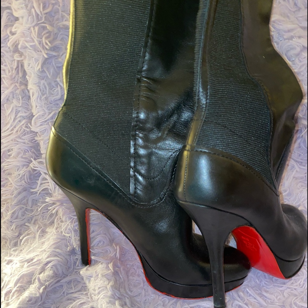 Joan & David leather stiletto heel boots with bottoms painted red